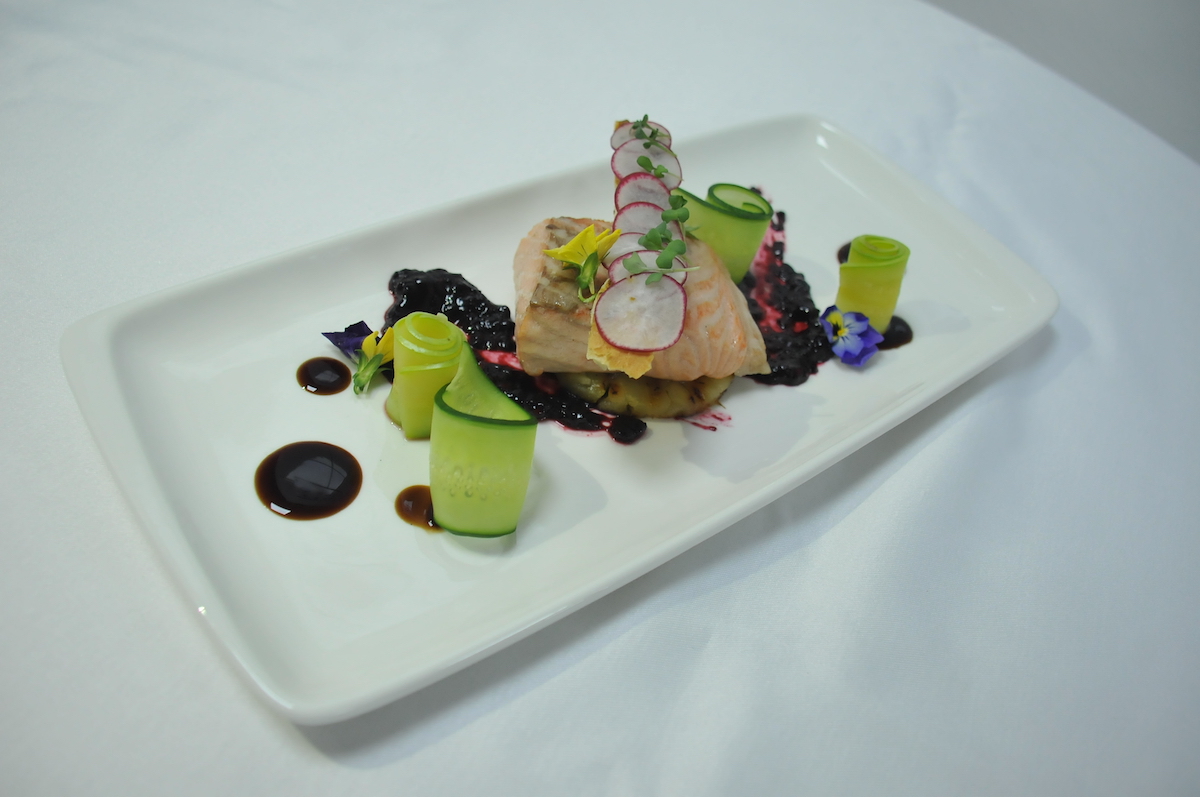Steamed salmon with blackberry sauce